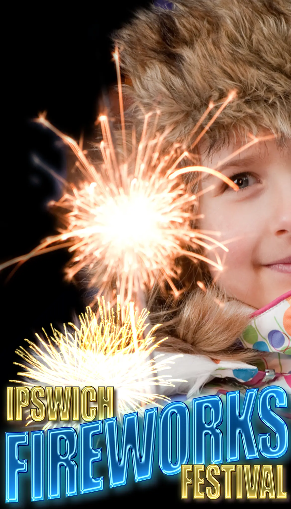 Image of child holding a sparkler at Ipswich Fireworks